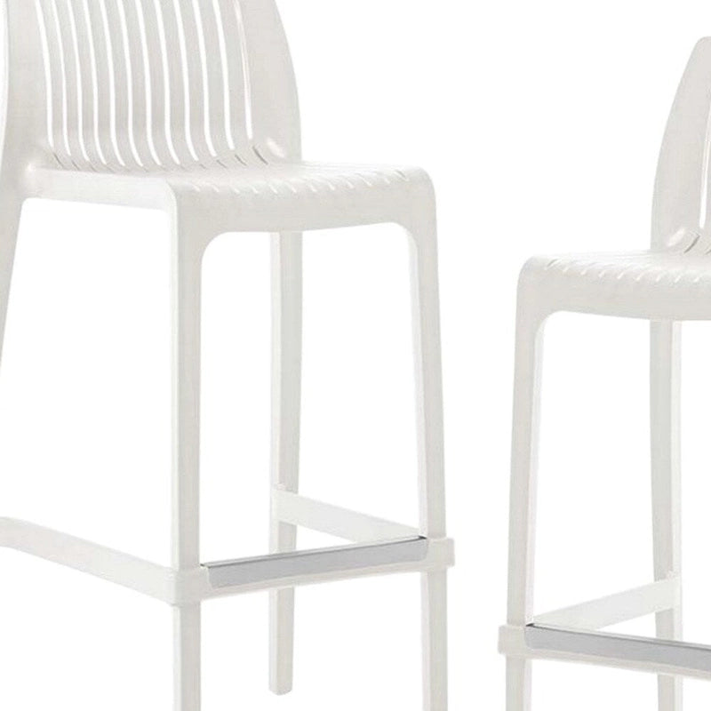 HomeRoots Set of Four 30  White Heavy Duty Plastic Low Back Outdoor Bar Height Chairs